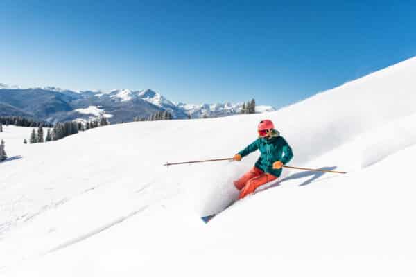 A skier makes fresh tracks in untouched powder in the Back Bowls at Vail Mountain in Colorado.