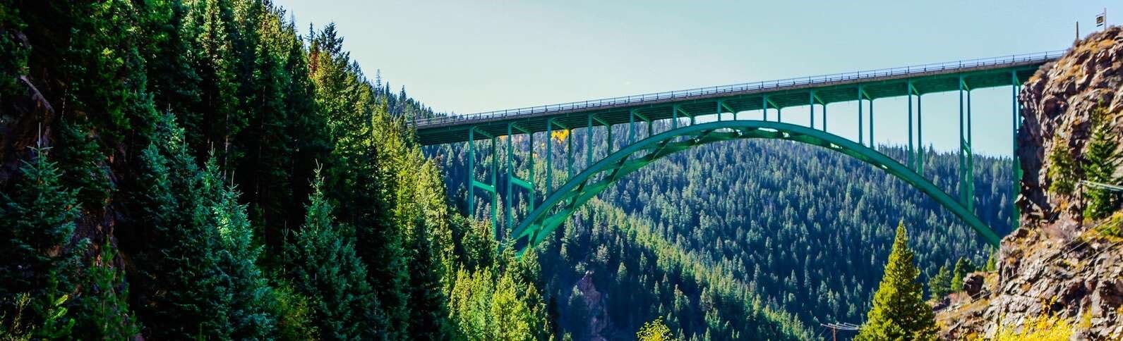 The iconic Red Cliff Bridge stretches between rocky outcroppings near Vail, CO.