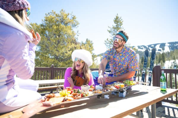 Friends having a picnic on vail mountain