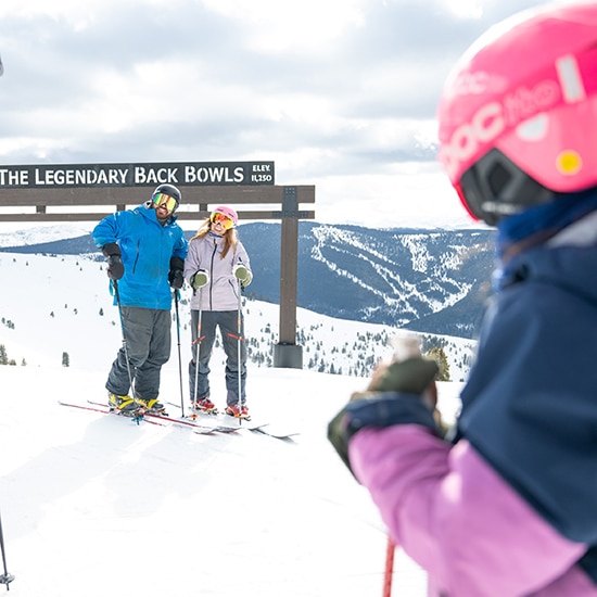 Family skiing on Vail Mountain in Colorado