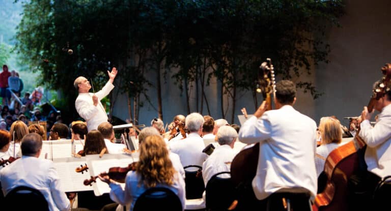 conductor leads orchestra at Bravo Vail event