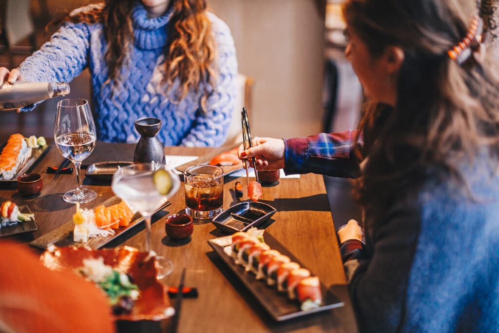 At Mokoto Vail inside the Grand Hyatt Vail Resort and Spa, two dinners savor platters of fresh sushi and glasses of sake.