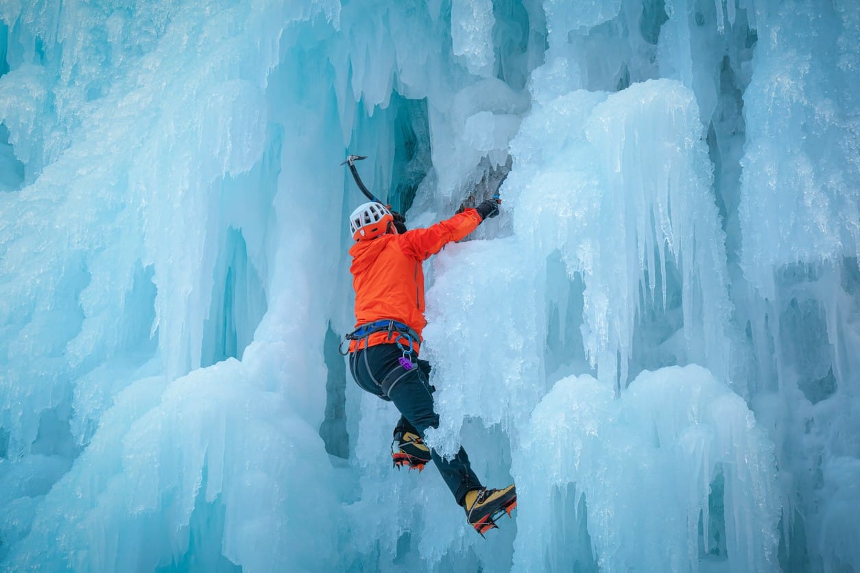 man-ice-climbing